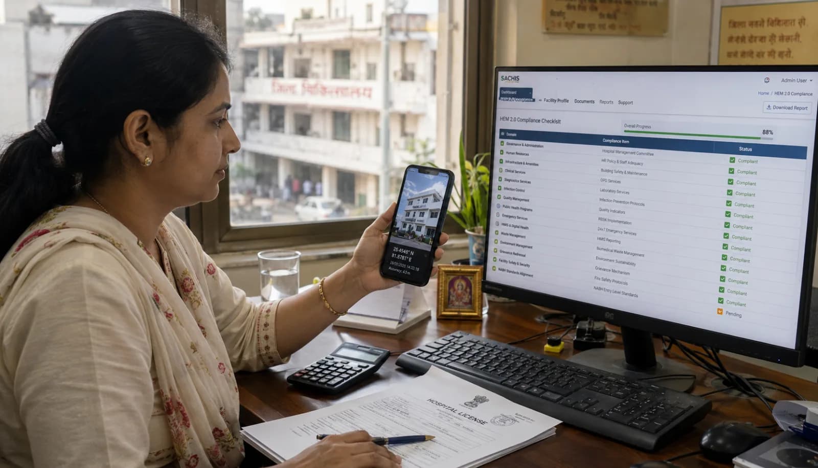 Indian UP hospital administrator uploading hospital details to SACHIS portal for HEM 2.0 compliance with geo-tagged hospital photos visible